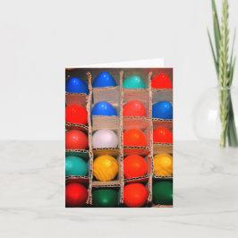 Farbenfrohe Weihnachtsleuchten in einer Schachtel Karte