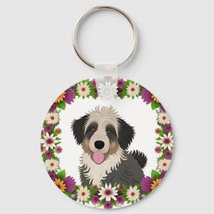 Farbenfroher Blumenrahmen mit süßer Hunde-Illustra Schlüsselanhänger
