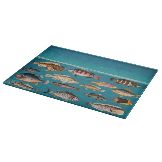 Farbenfroher Fisch unter blauem Meer Schneidebrett (Ecke)