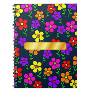 Farbenfrohes Blumenmuster mit goldener Aufschrift Notizblock