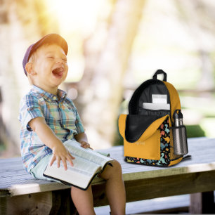Farbenfrohes Dinosaurier-Muster gelb schwarz Name  Bedruckter Rucksack