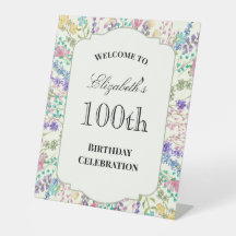 Farbenfrohes florales Willkommensschild zum 100. G