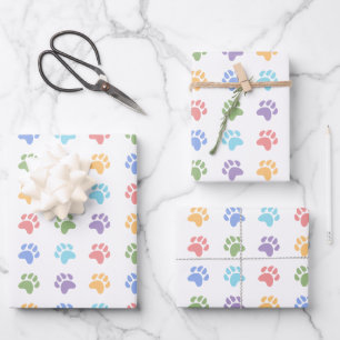 Farbenfrohes Muster aus Tierpfotenabdrücken Hundep Geschenkpapier Set