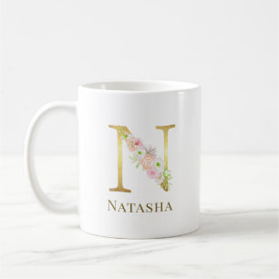 Farbflorale und goldene Buchstaben E Monogramm Kaffeetasse