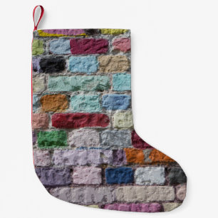 Farbig bemalte Ziegelwandstruktur Kleiner Weihnachtsstrumpf