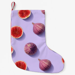 Farbige Fruchtmuster von frischen Feigen auf lila Kleiner Weihnachtsstrumpf