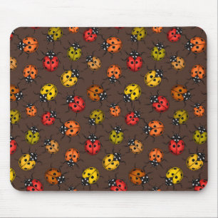 Farbige Marienkäfer auf Braun Mousepad
