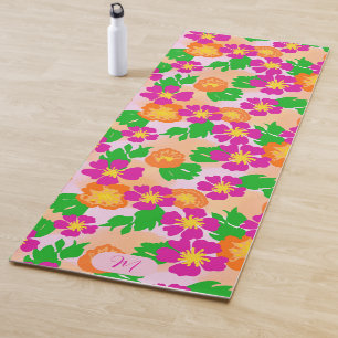 Farbige pinke orange und grüne florale Yogamatte