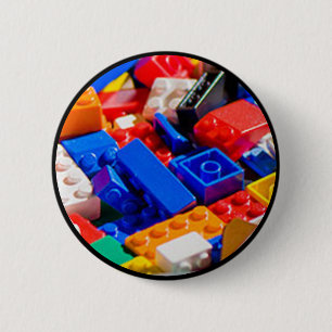 Farbige Spielzeug-Ziegelplatte Button