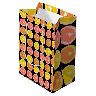 Farbige und helle Grapefruit-Scheiben  Mittlere Geschenktüte