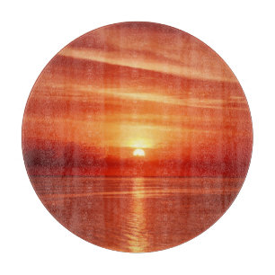 Farbiger Sonnenaufgang auf See, dramatische Wolken Schneidebrett