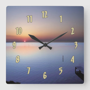 Farbiger Sonnenuntergang Quadratische Wanduhr