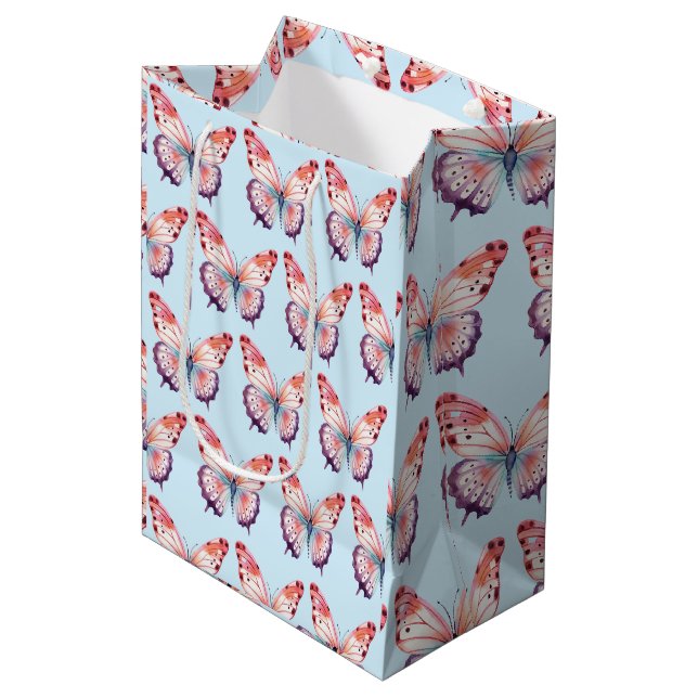 Farbschmetterling in rosa Lila und blau Mittlere Geschenktüte (Vorderseite Schrägansicht)