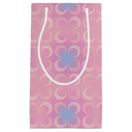 Farbtöne mit rosa, rosa und blauem Hintergrund Kleine Geschenktüte