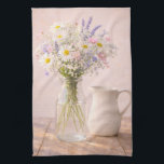 Farmhouse Wildflower Jar and Ceramic Pitcher Geschirrtuch<br><div class="desc">This farmhouse wildflower kitchen towel features a soft bouquet of daisies, lavender, and delicate pink flowers arranged in a clear glass jar beside a classic white ceramic pitcher. The warm rustic wooden table and gentle natural lighting create a peaceful cottage inspired scene. Perfect for farmhouse kitchens, dining rooms, bedrooms, or...</div>