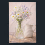 Farmhouse Wildflower Jar and Ceramic Pitcher Geschirrtuch<br><div class="desc">This farmhouse wildflower kitchen towel features a soft bouquet of daisies, lavender, and delicate pink flowers arranged in a clear glass jar beside a classic white ceramic pitcher. The warm rustic wooden table and gentle natural lighting create a peaceful cottage inspired scene. Perfect for farmhouse kitchens, dining rooms, bedrooms, or...</div>