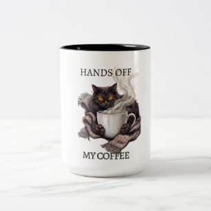 Fass meine Kaffeetasse nicht an Lustige müde Katze