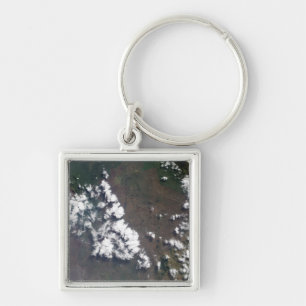 Feder steigt von Nyiragongo Vulkan im EAW Schlüsselanhänger