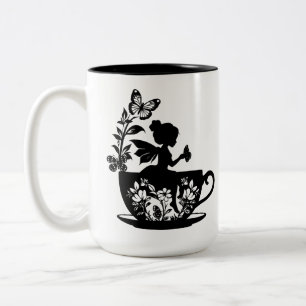 Fee in einem Teecup Zweifarbige Tasse