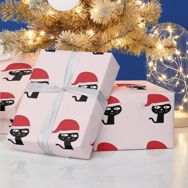 Feierliche Katze mit roter Weihnachtsmannmütze Mod Geschenkpapier (Feiertage)