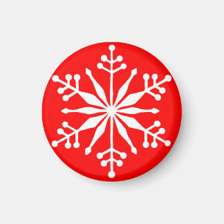 Feierliche Schneeflocke auf einem roten Ziermagnet Magnet