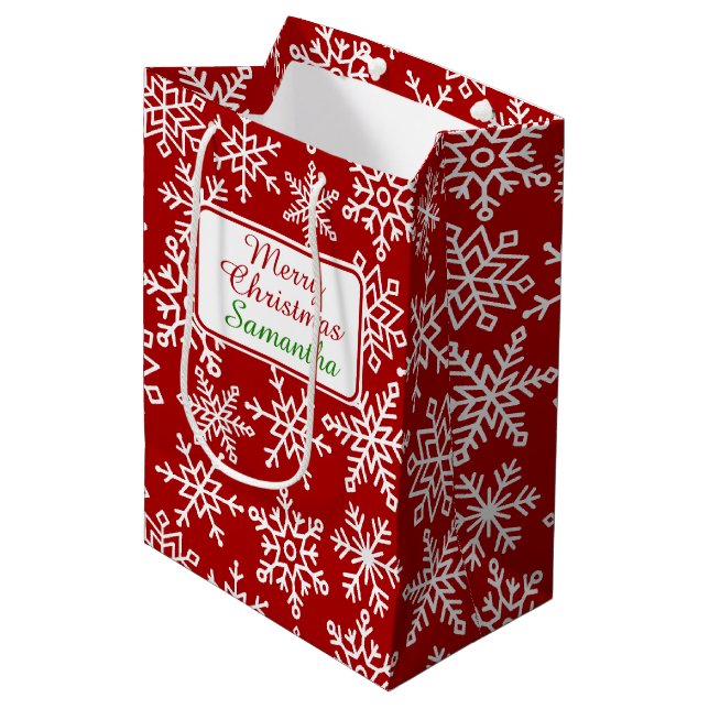 Feierliche Schneeflocke Rotes Weihnachten Mittlere Geschenktüte (Vorderseite Schrägansicht)