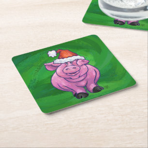 Feierliches Schwein in Weihnachtsmannmütze auf Grü Rechteckiger Pappuntersetzer