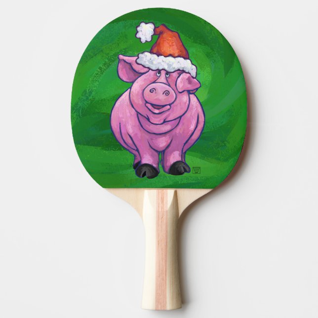 Feierliches Schwein in Weihnachtsmannmütze auf Grü Tischtennis Schläger (Vorderseite)