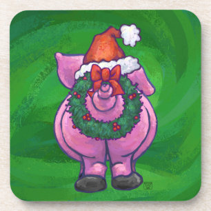 Feierliches Schwein in Weihnachtsmannmütze auf Grü Untersetzer