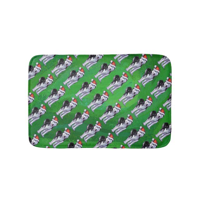 Feiernder Husky in Weihnachtsmannmütze auf Green Badematte (Vorderseite)