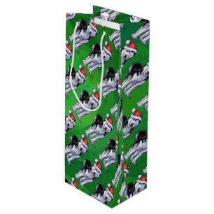 Feiernder Husky in Weihnachtsmannmütze auf Green Geschenktüte Für Weinflaschen