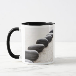 Felsen auf Sand Tasse