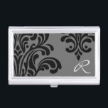 Feminine Damask Monogram Visitenkarten Etui<br><div class="desc">Ein elegantes feminines Design mit einem schwarzen Damast-Muster auf grauem Hintergrund und personalisiert mit einem Monogramm. Ändern Sie das Monogramm in Ihr eigenes,  indem Sie den Beispieltext in der Entwurfsvorlage ersetzen.</div>