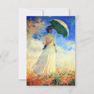 Femme Monet avec un Parasol face à la carte de dro