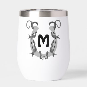 Fer à cheval enveloppé dans un monogramme de fil d