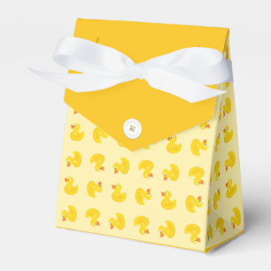 Fertigen Sie, Gummiente besonders an Geschenkschachtel