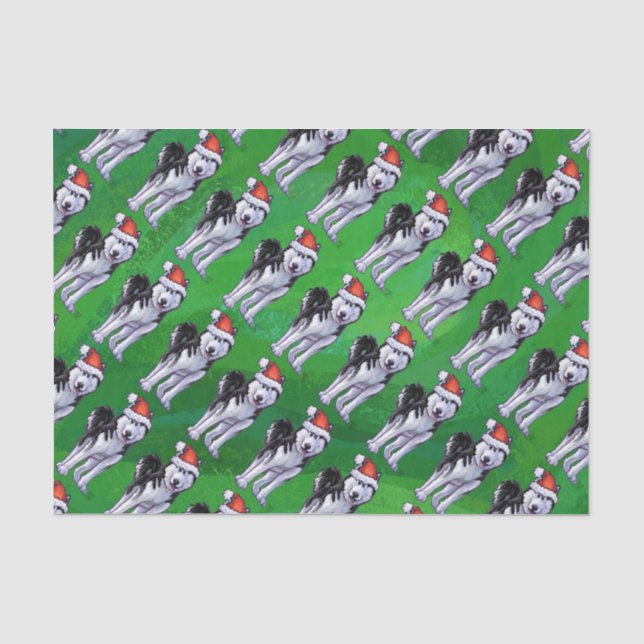 Fest Husky in der Weihnachtsmannmütze auf Grün Seidenpapier (Vorderseite)