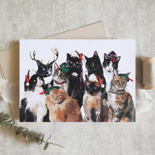 Festliche Aquarellkatzen mit Weihnachtsmannmützen  Feiertagskarte