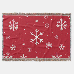 Festlicher roter Hintergrund mit weißen Schneefloc Decke