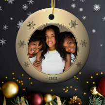 Festliches goldenes metallisches Schneeflocken-Fam
