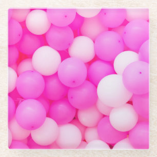 Festliches Hintergrunddesign mit rosa Ballons. Glasuntersetzer