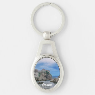 Festungsmauern, Felsküste und Meer in Kroatien Schlüsselanhänger