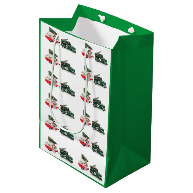 Festwagen und Camper Weihnachten rot und grün Mittlere Geschenktüte (Vorderseite Schrägansicht)