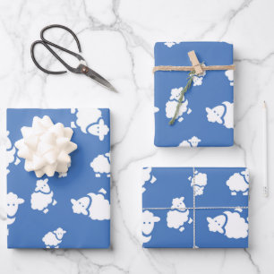 Feuille De Papier Cadeau Cartoon Sheep sur arrière - plan bleu
