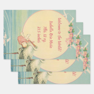 Feuille De Papier Cadeau Cigogne vintage avec bébé fille dans une couvertur
