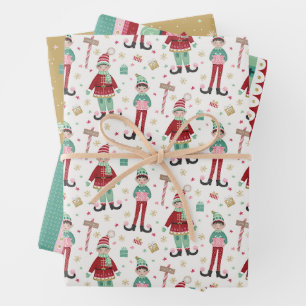 Feuille De Papier Cadeau Ensemble de trois elfes de Noël colorés