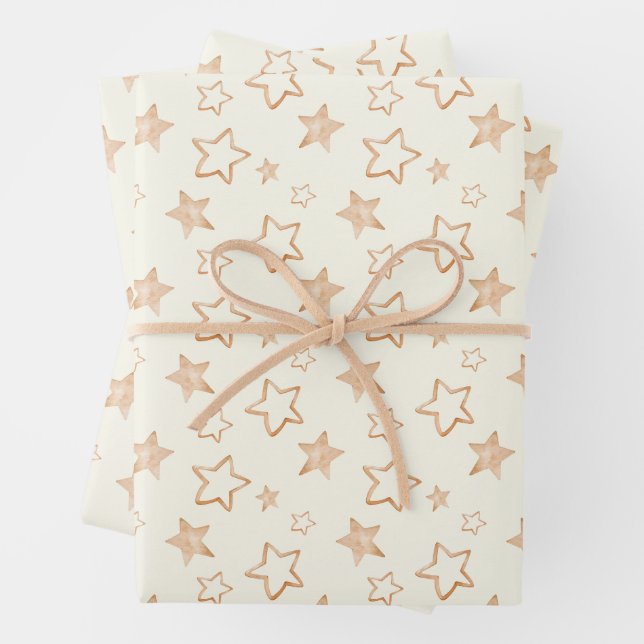 Feuille De Papier Cadeau Étoiles d'or sur l'ivoire (En situation)