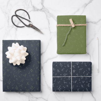 Feuille De Papier Cadeau festif étoilé bleu marine et vert