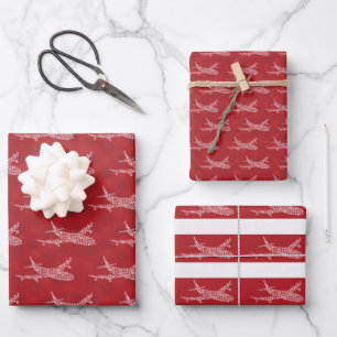 Feuille De Papier Cadeau Flocon de neige Avion en rouge. Envelopper les feu