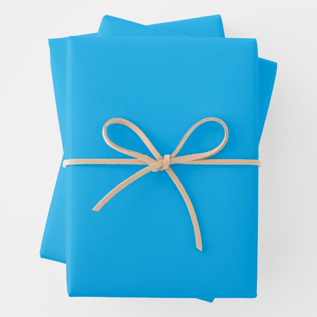 Feuille De Papier Cadeau Fond uni bleu cyan  (En situation)
